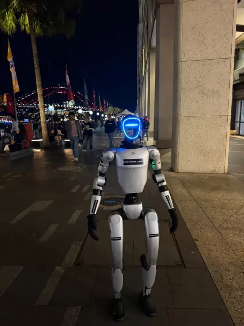 Rocco humanoid robot at Circular Quay with Sydney Harbour Bridge behind
