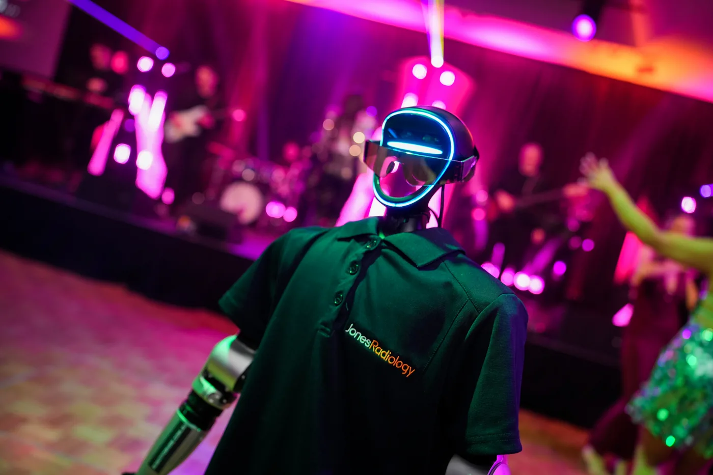 Rocco in front of the live band and dancing guests at the Jones Radiology celebration