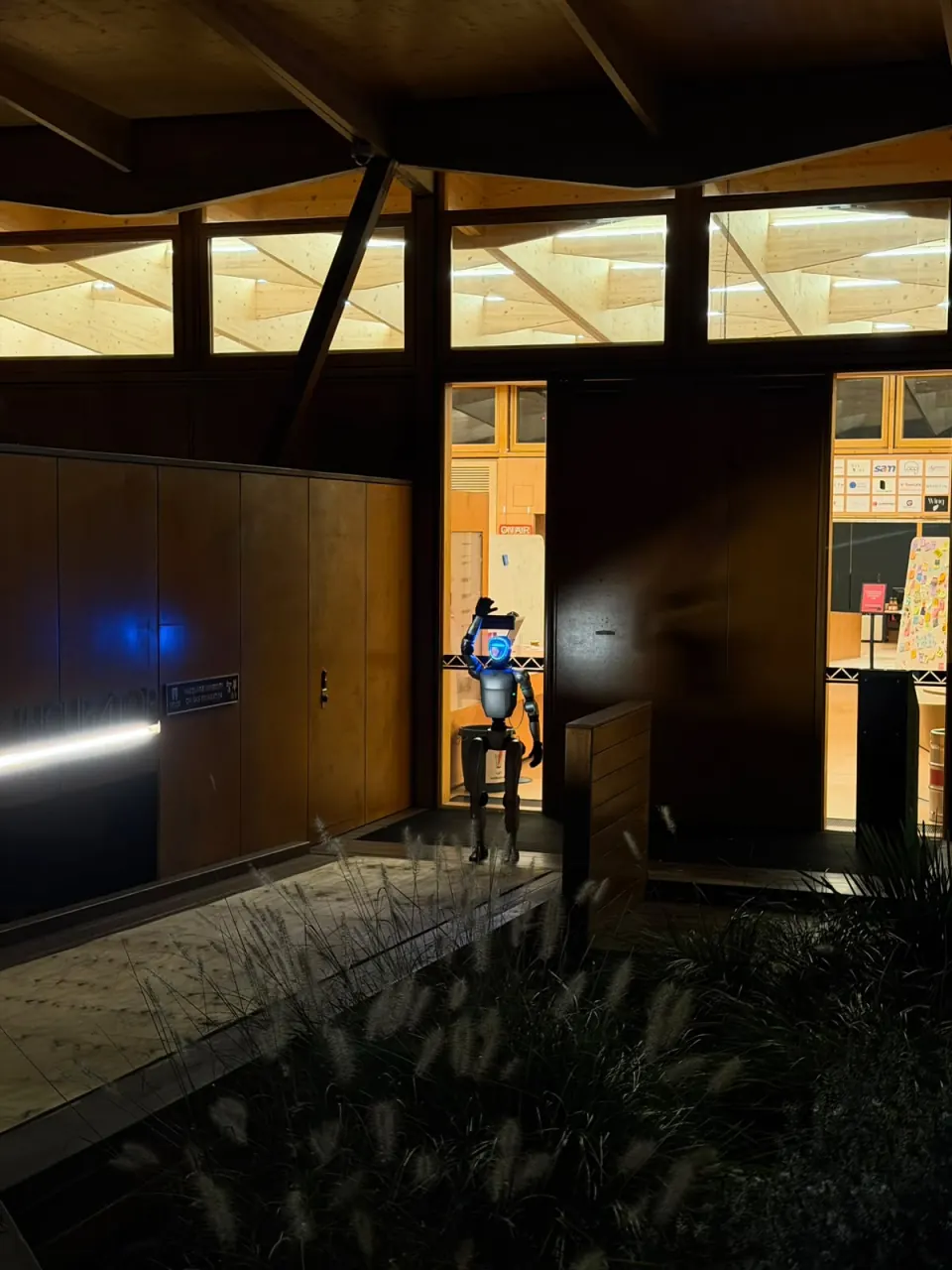 Rocco humanoid robot arriving at an evening office party event